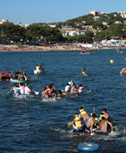 Arribada de les embarcacions a la platja